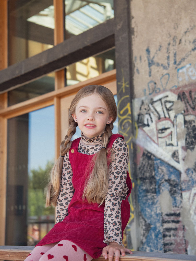 Robe salopette rouge en velours pour fille