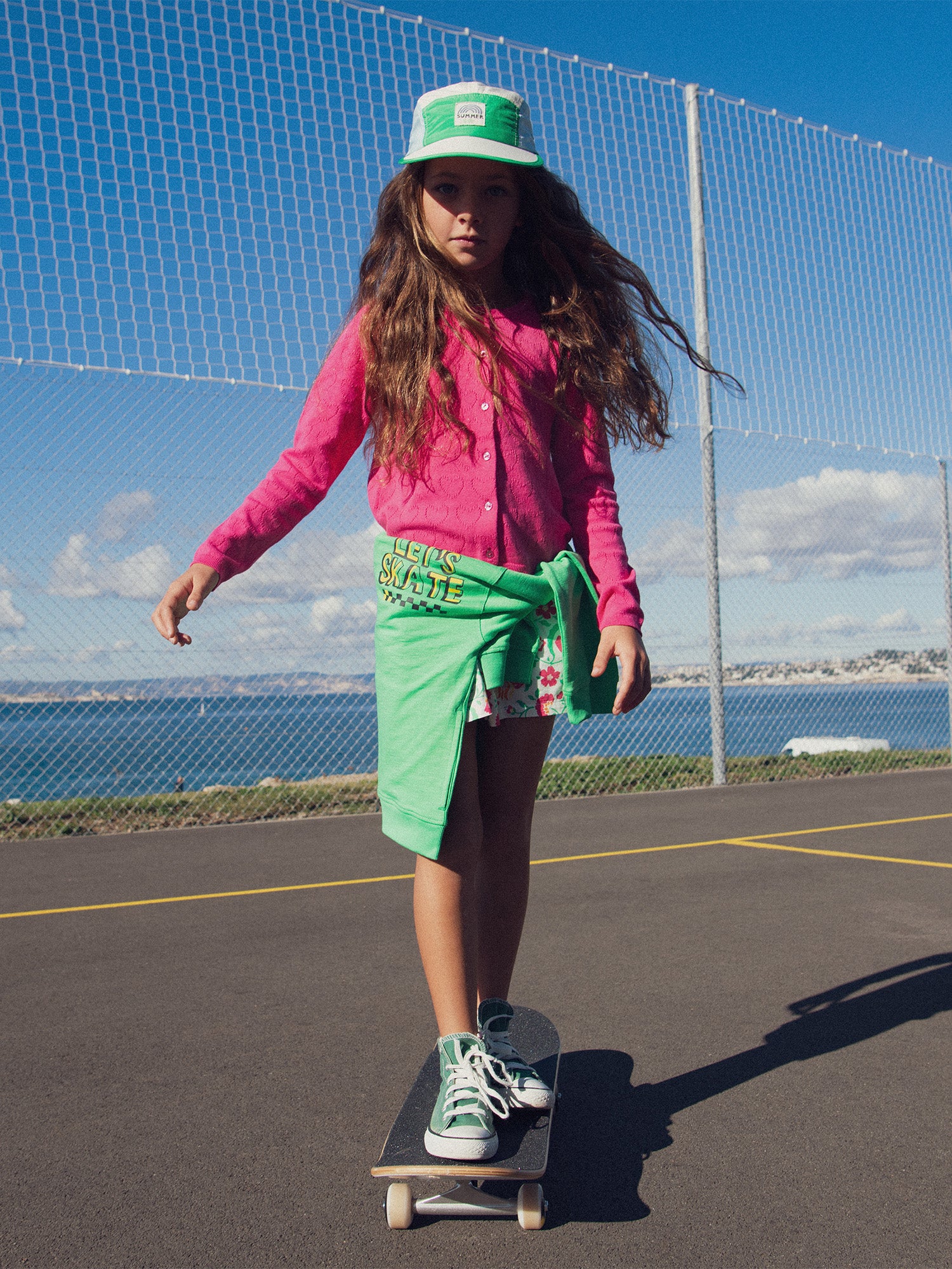 Cardigan rose en pointelle coeur pour fille