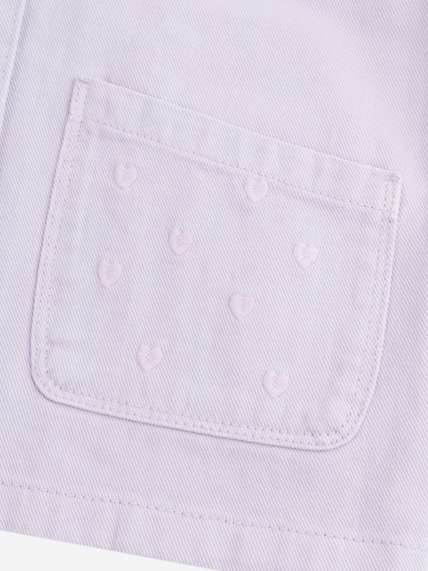 Veste violette à poches et broderies coeur pour fille