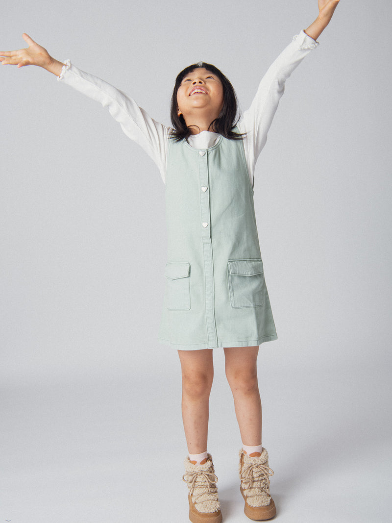 Robe verte sauge à poches pour fille
