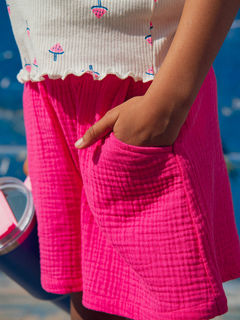 Short rose à poches pour fille