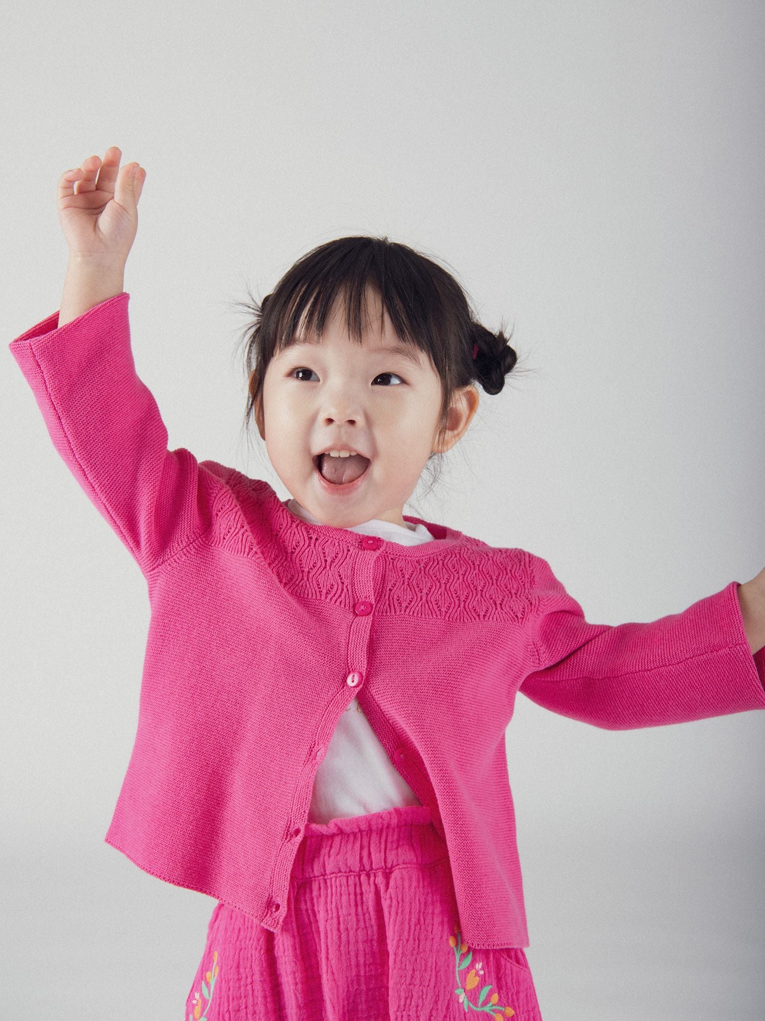 Cardigan en maille fantaisie rose passion pour bébé fille