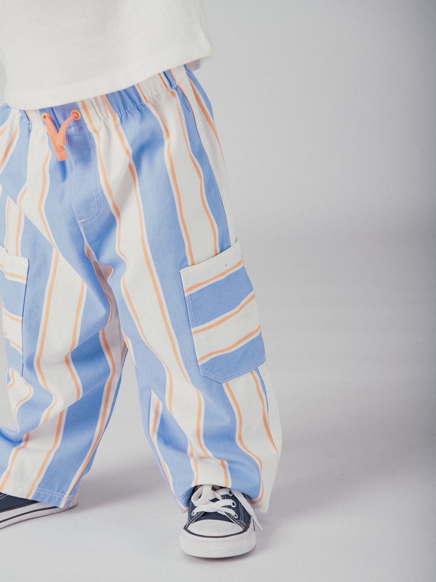 Pantalon rayé bleu et pêche pour bébé garçon