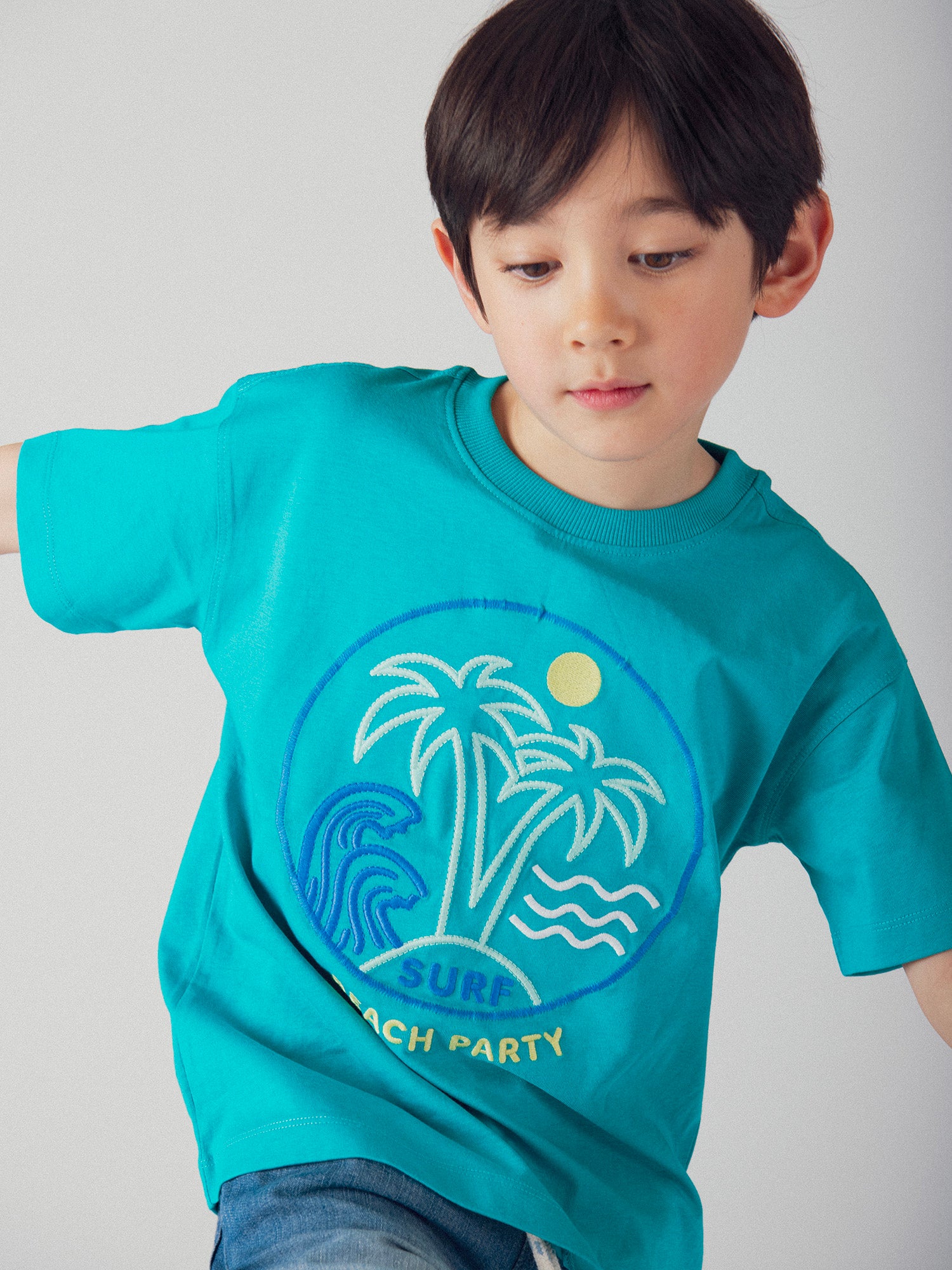 T-shirt bleu turquoise animation plage pour garçon